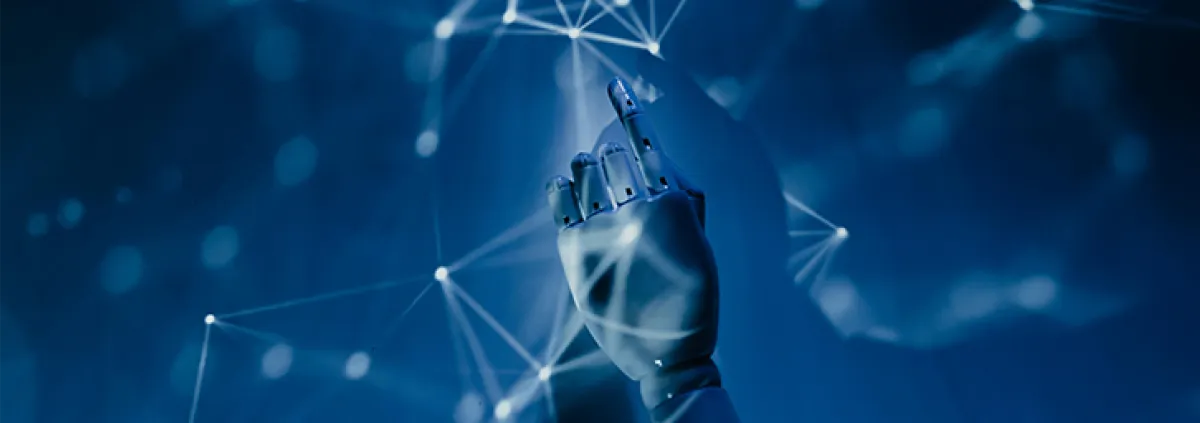 Künstliche Hand zeigt auf Lichtpunkte